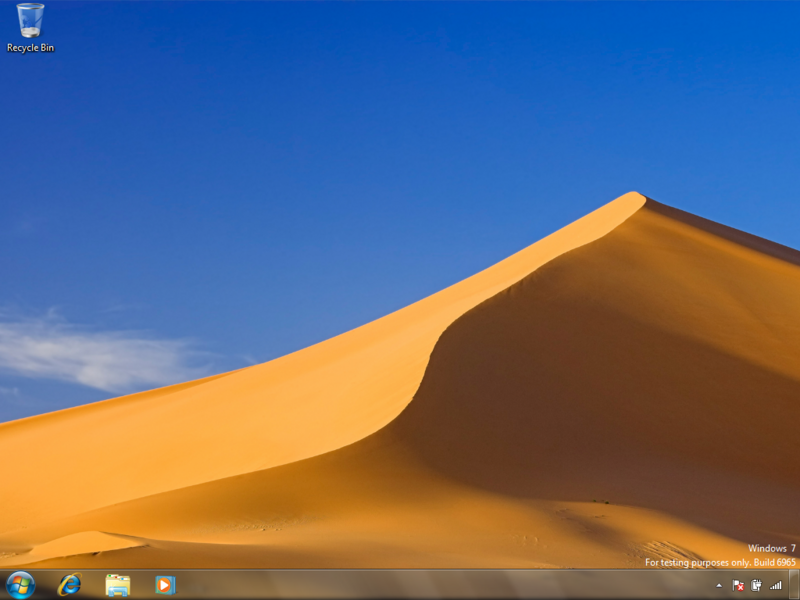 File:Windows 7 Build 6965 Desktop.png