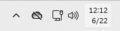 The taskbar with shortened date/time and without notification bell icon