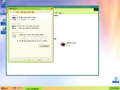 Windows XP build 2419 showing the skinned taskbar